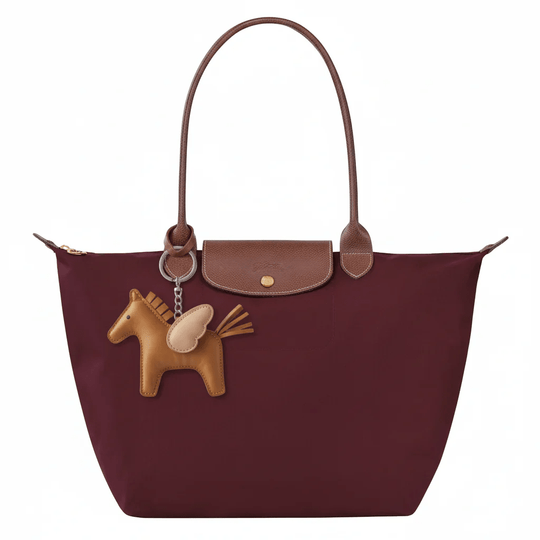 CHARM DE CABALLO ALADO EN PIEL - RIVENA MODA