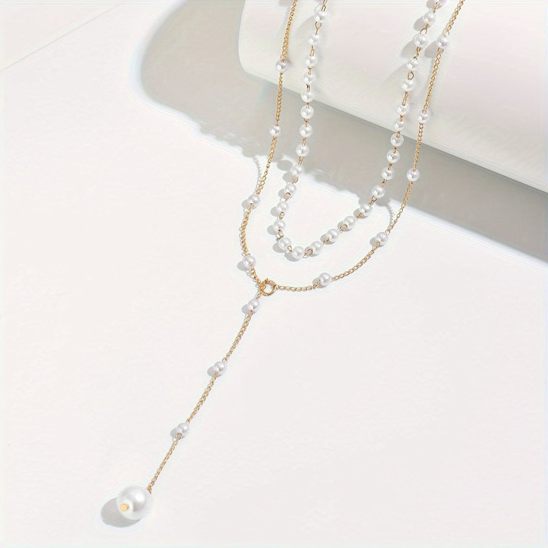 COLLAR CON PERLAS - RIVENA MODA