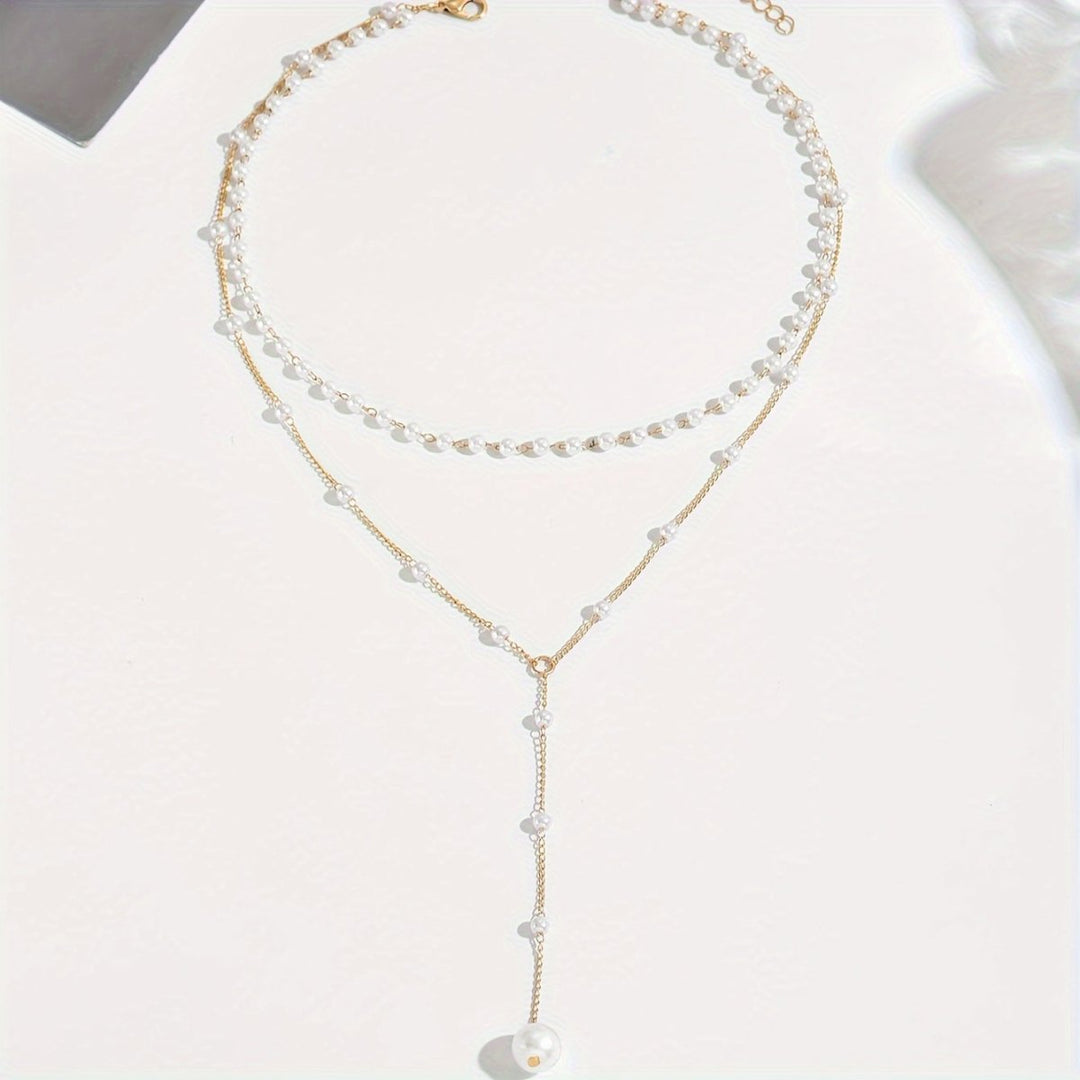 COLLAR CON PERLAS - RIVENA MODA