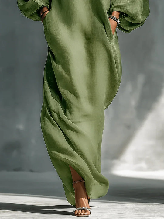 Selena | Vestido largo verde fluido con hombros descubiertos y mangas amplias - RivenaModa